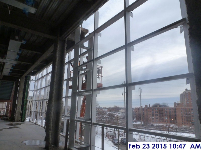 Installing weather strips at the curtain wall Facing South